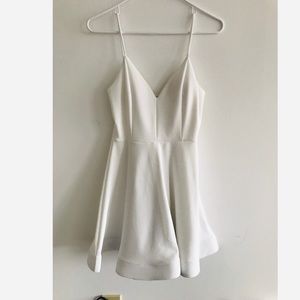 Ivory Fit and flare mini dress “ take a spin”